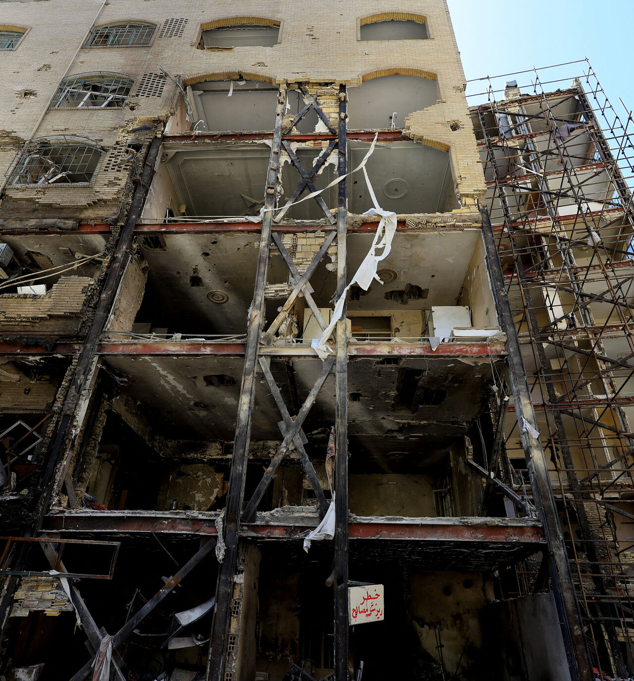A residential building damaged by a strike on March 4, in Tehran, Iran, April 14, 2026. REUTERS/Thaier Al Sudani/File Photo