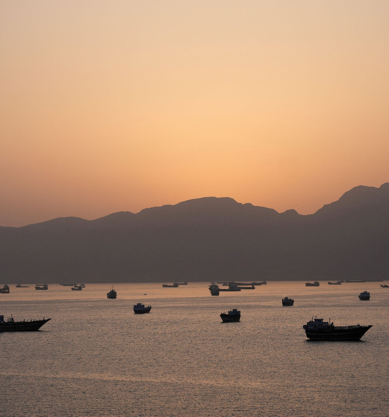 FILE PHOTO: Ships and boats in the Strait of Hormuz, Musandam, Oman, May 1, 2026. REUTERS/Stringer/File Photo