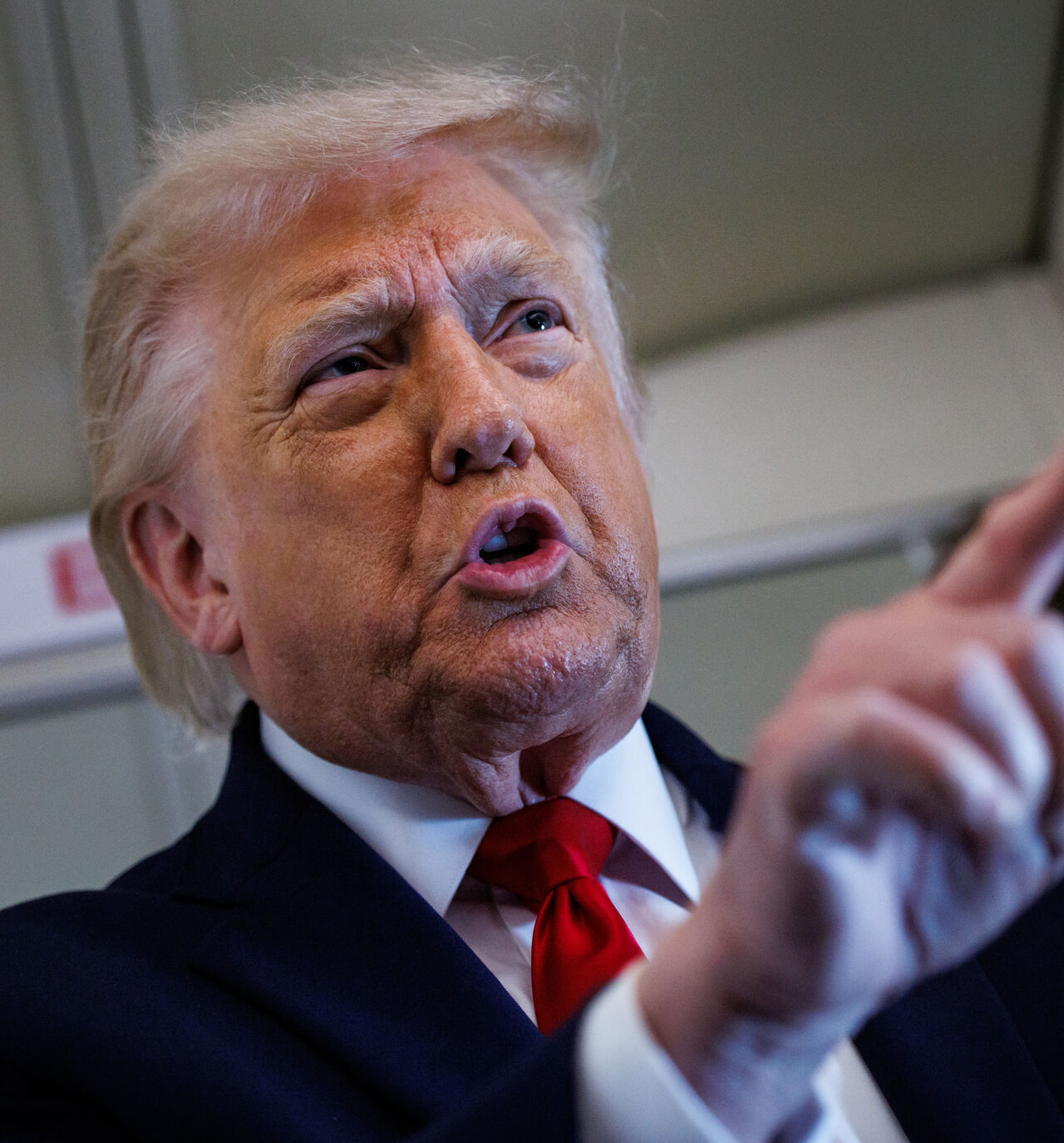 US President Donald Trump speaks with reporters while aboard Air Force One en route to Chippewa Falls, Wisconsin on June 5, 2026. 