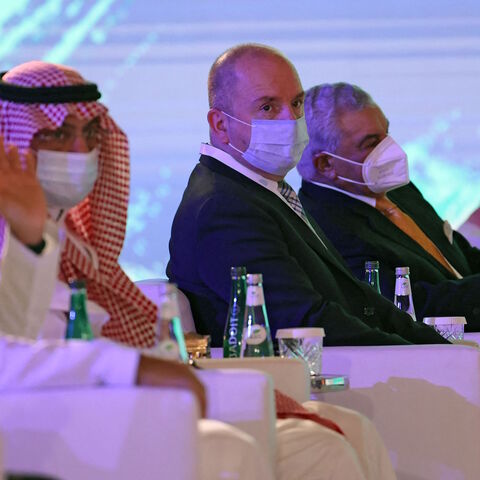 Syrian Tourism Minister Mohammed Rami Martini (C) attends a tourism conference in the Saudi capital Riyadh on May 26, 2021, despite tense relations between the two countries.  