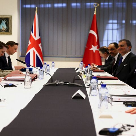 Britain's Prime Minister Boris Johnson (L) and Turkey's President Tayyip Erdogan (2R).
