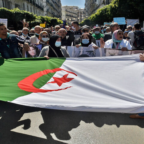 Algerian anti-government protesters take to the streets of Algiers as the Hirak pro-democracy movement keeps up its weekly demonstrations despite a ban on gatherings due to the coronavirus pandemic, Algeria, March 26, 2021.