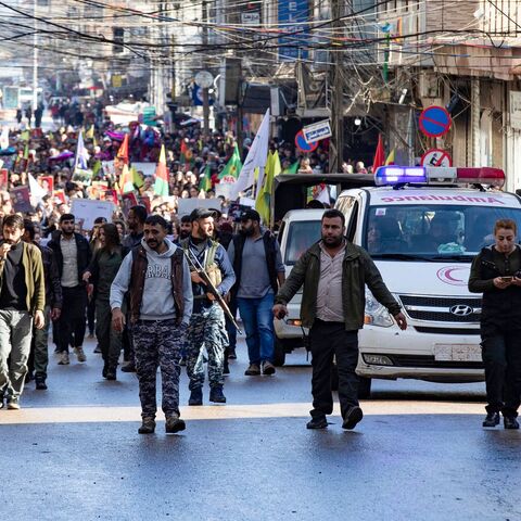 Syrian-Kurdish demonstrators take to the streets to protest against Turkey.