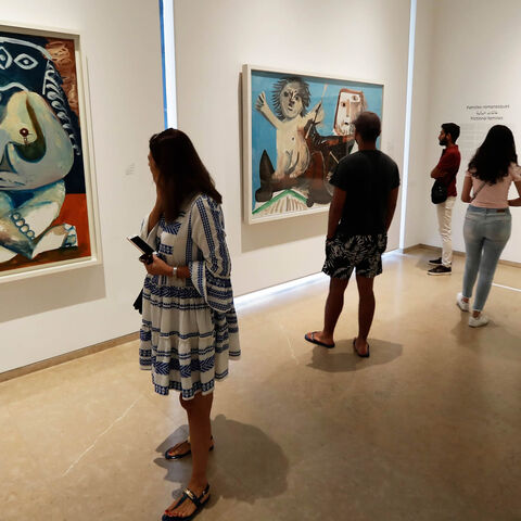 Visitors look at paintings by Spanish artist Pablo Picasso displayed at the Sursock Museum, Beirut, Lebanon, Sept. 27, 2019.