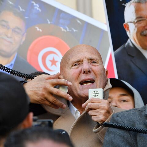 Ahmed Nejib Chebbi, political committee chief of Tunisia's Amal Party and leader of the opposition National Salvation Front part in a demonstration in Tunis on March 5, 2023, in defiance of a protest ban, demanding the release of prominent figures opposed to the president who were arrested in recent weeks. - More than 20 political figures have been arrested in the North African country in recent weeks, including members the main opposition coalition, the National Salvation Front (NSF) and its main component