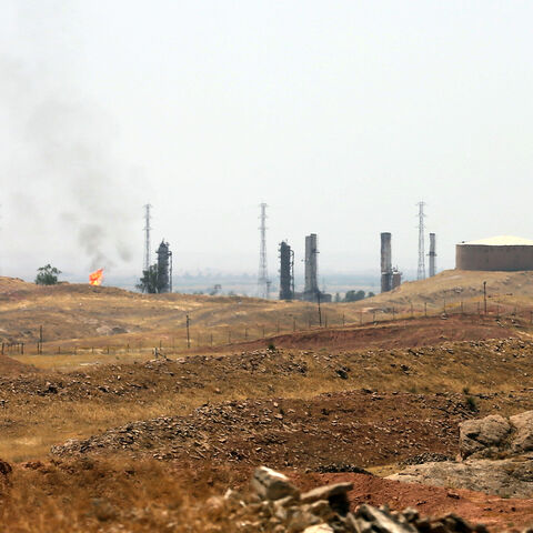 A view of an oil refinery in the Iraqi city of Kirkuk, on June 20, 2014. Kurdish forces took control of Kirkuk and other disputed territory as Sunni Arab militants pressed an offensive that has seen them seize a large chunk of Iraq and sweep federal security forces aside. AFP PHOTO/KARIM SAHIB (Photo by KARIM SAHIB / AFP) (Photo by KARIM SAHIB/AFP via Getty Images)