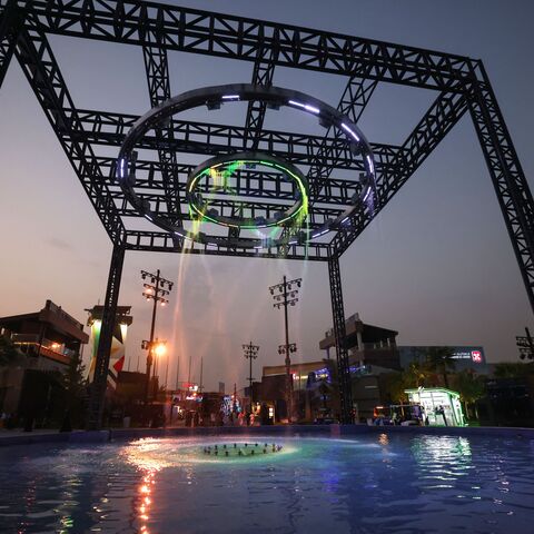 People watch a water curtain fountain at the Boulevard entertainment city in Riyadh on August 29, 2023. (Photo by Fayez Nureldine / AFP) (Photo by FAYEZ NURELDINE/AFP via Getty Images)