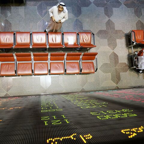 Kuwaiti traders follow the market's movement at the Stock Exchange, Kuwait City, March 8, 2018.