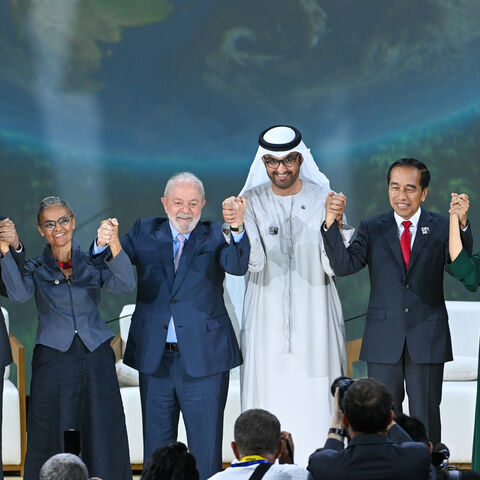 In this handout image supplied by COP28, Luiz Inácio Lula da Silva (L3), President of the Federative Republic of Brazil and Marina Silva (L2), Minister of the Environment, Joko Widodo (R2), President of the Republic of Indonesia, H.E Razan Al Mubarak (R1), President of the International Union for Conservation of Nature and Climate Change of Brazil and His Excellency Dr. Sultan Al Jaber (R3), COP28 President during the Nature Season at Al Waha Theatre during day two of the high-level segment of the UNFCCC CO