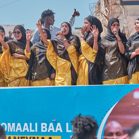 A group of singers perform Somali nationalistic songs during a demonstration in support of Somalia's government following the port deal signed between Ethiopia and the breakaway region of Somaliland at Eng Yariisow Stadium in Mogadishu on January 3, 2024. Somalia vowed to defend its territory after a controversial Red Sea access deal between Ethiopia and the breakaway state of Somaliland that it branded as "aggression". (Photo by ABDISHUKRI HAYBE / AFP) (Photo by ABDISHUKRI HAYBE/AFP via Getty Images)