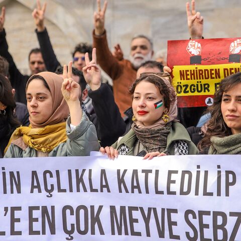 People are gathered to protest cooperation between Turkey and Israel.