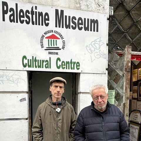 Ron Mendel and Peace, volunteers at the Palestine Museum and Cultural Centre in Bristol, southwest England, stand outside the museum in April 2024.