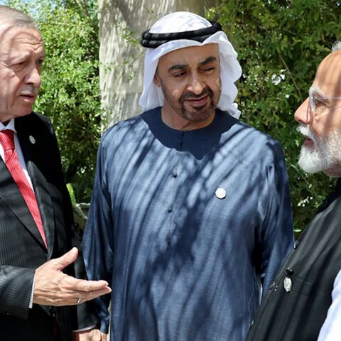 Turkish President Recep Tayyip Erdogan (L) speaks with UAE President Sheikh Mohammed bin Zayed Al Nahyan and Indian President Narendra Modi on the sidelines of the G-7 summit, June 14, 2024, Apulia, Italy.