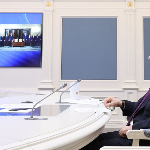 Russian President Vladimir Putin takes part in the ceremony of signing an agreement on the construction of the Rasht-Astara railway.