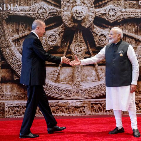 Turkey's President Recep Tayyip Erdogan (L) and India's Prime Minister Narendra Modi shake hands ahead of the G20 Leaders' Summit in New Delhi on September 9, 2023. (Photo by Ludovic MARIN / POOL / AFP) (Photo by LUDOVIC MARIN/POOL/AFP via Getty Images)