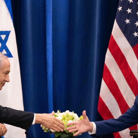 TOPSHOT - US President Joe Biden shakes hands with Israeli Prime Minister Benjamin Netanyahu as they meet on the sidelines of the 78th United Nations General Assembly in New York City on September 20, 2023. (Photo by Jim WATSON / AFP) (Photo by JIM WATSON/AFP via Getty Images)