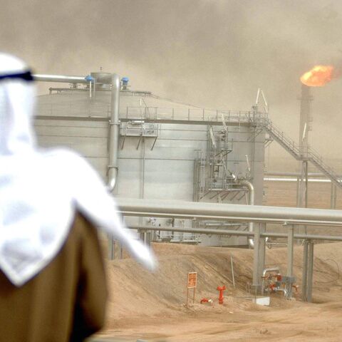 An employee of the Kuwait Oil Company (KOC) looks on Jan. 25, 2005, the Gathering Center No.1 5 of al-Rawdatain field, 100 kilometers north of Kuwait City.