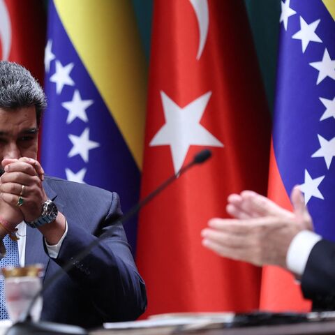 Turkey's president, Recep Tayyip Erdogan (R), and his Venezuelan counterpart Nicolas Maduro (L) attend a joint press conference after their meeting in Ankara on June 8, 2022.