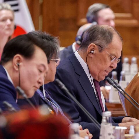 Russian Foreign Minister Sergei Lavrov (C) and Saudi Arabia's Crown Prince and Prime Minister Mohammed bin Salman (2L) attend the first session of the G20 Leaders' Summit at the Bharat Mandapam in New Delhi on Sept. 9, 2023. 