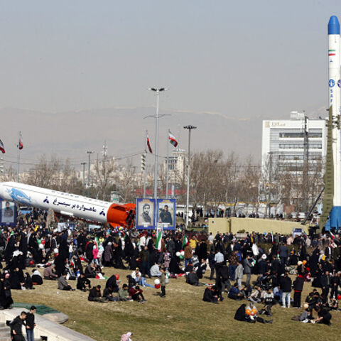 Iran's two-stage Simorgh (Phoenix) satellite carrier(L) and Iranian built Safir-type rocket that is designed to carry a satellite into orbit, are displayed in Tehran as people gather to mark the 45th anniversary of the Islamic revolution on February 11, 2024. Iran marked 45 years since the Islamic revolution with a ceremony on February 11, in which the country's president condemned arch foe Israel and demanded it be expelled from the United Nations. (Photo by AFP) (Photo by -/AFP via Getty Images)