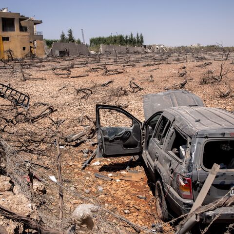 A destroyed car and apartment building are seen after an Israeli airstrike on Aug. 20 that killed one and injured fifteen others, Nabi Chit, Lebanon, Aug. 21, 2024.