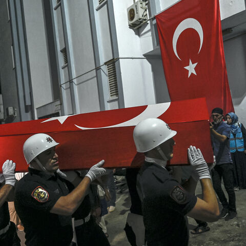 Coffin of US-Turkish activist Aysenur Ezgi Eygi, who was shot dead in the West Bank, is carried by Turkish honor guard police officers to a morgue at the Didim district in Aydin on Sept. 13, 2024. 