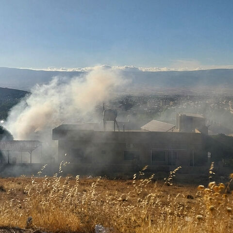 Smoke billows from a house in Baalbek in east Lebanon after a reported explosion of a radio device, on September 18, 2024, amid ongoing cross-border tensions between Israel and Hezbollah fighters. Communication devices exploded on July 18 in Hezbollah strongholds in Lebanon, as the Iran-backed group vowed to retaliate against Israel after a deadly wave of pager blasts that has raised fears of an all-out war. (Photo by AFP) (Photo by -/AFP via Getty Images)