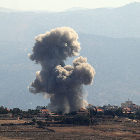 LEBANON-ISRAEL-PALESTINIAN-CONFLICT Smoke rises from the site of an Israeli airstrike that targeted the southern Lebanese village of Khiam on September 30, 2024. (Photo by Rabih DAHER / AFP) (Photo by RABIH DAHER/AFP via Getty Images)