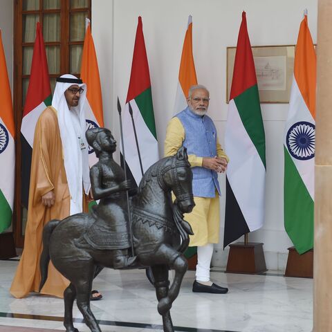 The President of UAE Mohammed Bin Zayed Al Nahyan (L) walks with Indian Prime Minister Narendra Modi ahead of a meeting in New Delhi on January 25, 2017. 