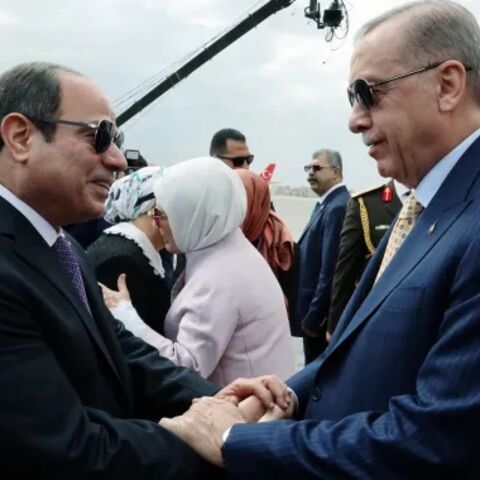 Turkey’s President Tayyip Erdogan is welcomed by Egypt's President Abdel Fattah al-Sisi at the airport in Cairo, Egypt February 14, 2024. Murat Cetinmuhurdar/Turkish Presidential Press Office