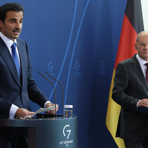 German Chancellor Olaf Scholz (R) and Emir of Qatar Sheikh Tamim bin Hamad al Thani speak to the media following talks at the Chancellery, Berlin, Germany, May 20, 2022.