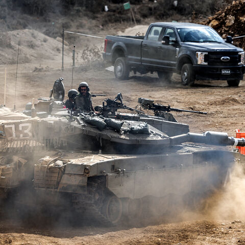 An Israeli army main battle tank moves at a position along the border with Lebanon in northern Israel on October 1, 2024. The Israeli army on October 1 said it launched a ground offensive in Lebanon and that its forces engaged in clashes, further escalating the conflict after a week of intense air strikes that killed hundreds. The UN peacekeeping mission in Lebanon said, however, the Israeli operation did not amount to a "ground incursion" and while Hezbollah denied any troops had crossed the border, an Isr