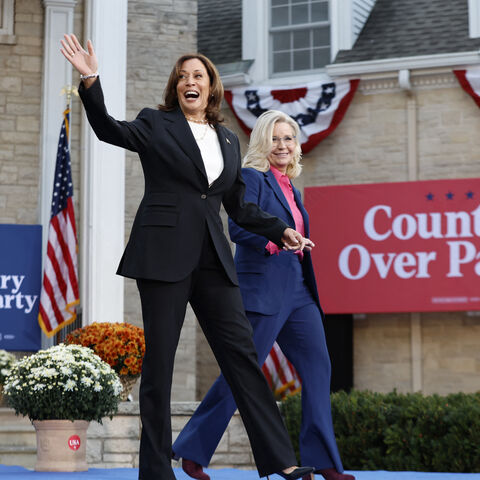 TOPSHOT - US Vice President and Democratic presidential candidate Kamala Harris and former US Representative Liz Cheney (R) arrive for a campaign event at Ripon College in Ripon, Wisconsin, October 3, 2024. (Photo by KAMIL KRZACZYNSKI / AFP) (Photo by KAMIL KRZACZYNSKI/AFP via Getty Images)