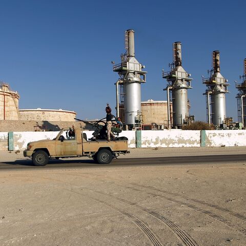 Forces opposed to Libya's unity government ride a truck in the Zueitina oil terminal, Sept. 14, 2016.