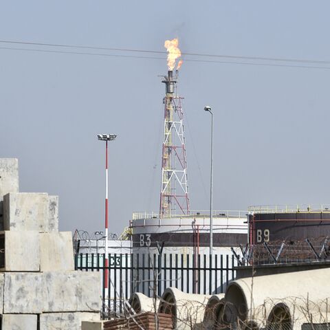 A flare stack burns excess emissions at the Algiers refinery complex in the Algerian capital's southeastern suburb of Baraki, on Feb. 24, 2022.