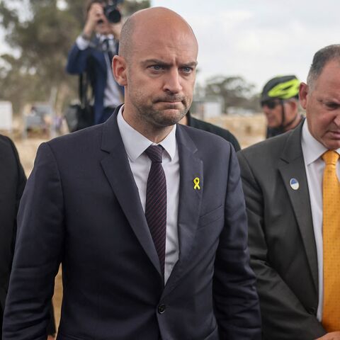 French Minister for Europe and Foreign Affairs Jean-Noel Barrot (C) visits the Nova festival memorial.