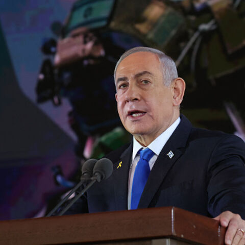 Israel's Prime Minister Benjamin Netanyahu delivers a speech during a ceremony marking the Hebrew calendar anniversary of the Hamas attack on October 7 last year that sparked the ongoing war in Gaza, at the Mount Herzl military cemetery in Jerusalem on October 27, 2024. (Photo by GIL COHEN-MAGEN / POOL / AFP) (Photo by GIL COHEN-MAGEN/POOL/AFP via Getty Images)