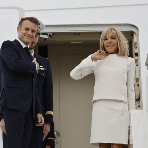 French President Emmanuel Macron and First Lady Brigitte Macron embark on an aircraft at the airport of Sale, north of Rabat, on Oct. 30, 2024.