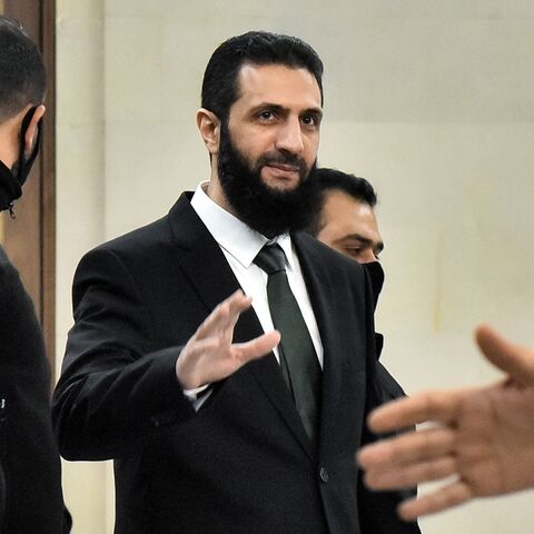 Hayat Tahrir al-Sham leader Ahmed al-Sharaa arrives for a meeting with visiting Druze officials from Lebanon's Progressive Socialist Party, in Damascus, on Dec. 22, 2024. 