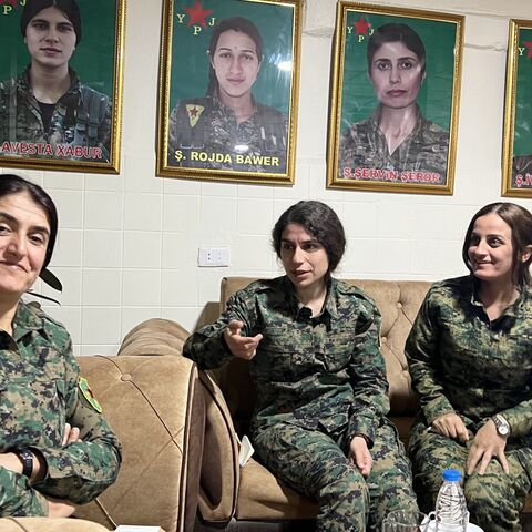 YPJ Commander in Chief Rojhelat Afrin pictured at YPJ headquarters near Al-Hasakh with YPJ spokesperson Heval Roksana and YPJ Field Commander Heval Kurdistan, Nov. 23, 204.