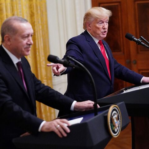 US President Donald Trump and Turkey's President Recep Tayyip Erdogan (L) take part in a joint press conference in the East Room of the White House in Washington, DC on November 13, 2019. President Donald Trump greeted his Turkish counterpart Recep Tayyip Erdogan at the White House for a high-stakes meeting Wednesday that underlined his claim to be ignoring the impeachment drama unfolding simultaneously in Congress. (Photo by MANDEL NGAN / AFP) (Photo by MANDEL NGAN/AFP via Getty Images)