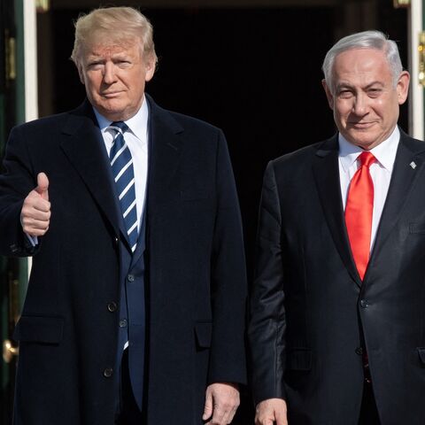 US President Donald Trump greets Israeli Prime Minister Benjamin Netanyahu as he arrives for meeting on the South Lawn of the White House in Washington, DC, Jan. 27, 2020.