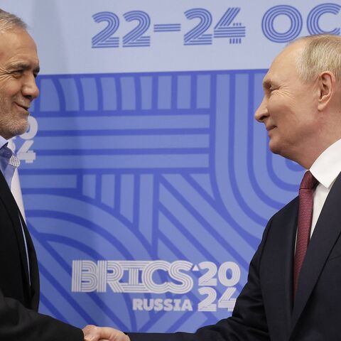 Russian President Vladimir Putin meets with Iranian President Masoud Pezeshkian on the sidelines of the BRICS summit in Kazan on Oct. 23, 2024.