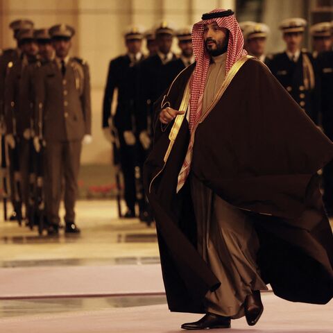 Saudi Arabia's Crown Prince Mohammed bin Salman walks to welcome France's president (not pictured) ahead of their meeting in Riyadh, on Dec. 2, 2024.