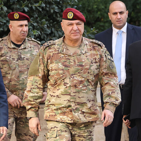 In this picture taken on Dec. 16, 2024, Lebanese army chief Joseph Aoun (C) walks toward the Grand Serail in Beirut. 