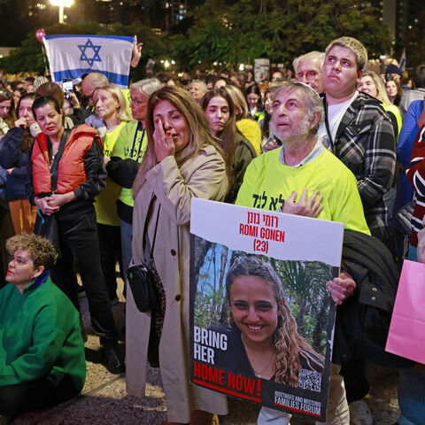 Supporters and relatives of hostages held captive in the Gaza Strip since the Oct. 7, 2023, attacks by Palestinian militants react while watching a live TV broadcast on the release of Israeli hostages, at Hostages Square in Tel Aviv, Israel, Jan. 19, 2025.