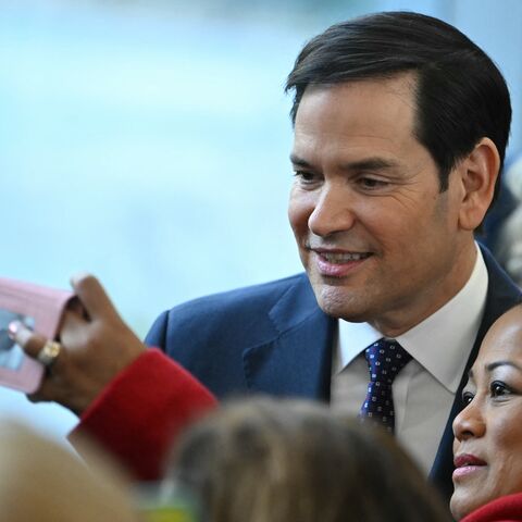 US Secretary of State Marco Rubio greets employees upon arrival at the State Department in Washington, DC, on January 21, 2025. The US Senate unanimously approved Rubio as Secretary of State on January 20, putting the fellow senator on the front line of President Donald Trump's often confrontational diplomacy. (Photo by ANDREW CABALLERO-REYNOLDS / AFP) (Photo by ANDREW CABALLERO-REYNOLDS/AFP via Getty Images)