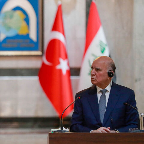 Turkey's Foreign Minister Hakan Fidan (L) speaks during a joint press conference with Iraq's Foreign Minister Fuad Hussein (R), Baghdad, Iraq, Aug. 22, 2023.