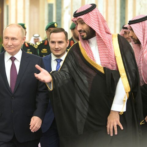 This pool photograph distributed by Russian state agency Sputnik shows Russia's President Vladimir Putin and Saudi Crown Prince Mohammed bin Salman attending a welcoming ceremony ahead of their talks in Riyadh on December 6, 2023. (Photo by Alexey NIKOLSKY / POOL / AFP) (Photo by ALEXEY NIKOLSKY/POOL/AFP via Getty Images)