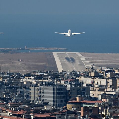 A commercial aircraft takes off from the runway of Beirut's international airport near the city's southern suburbs on Aug. 9, 2024. 